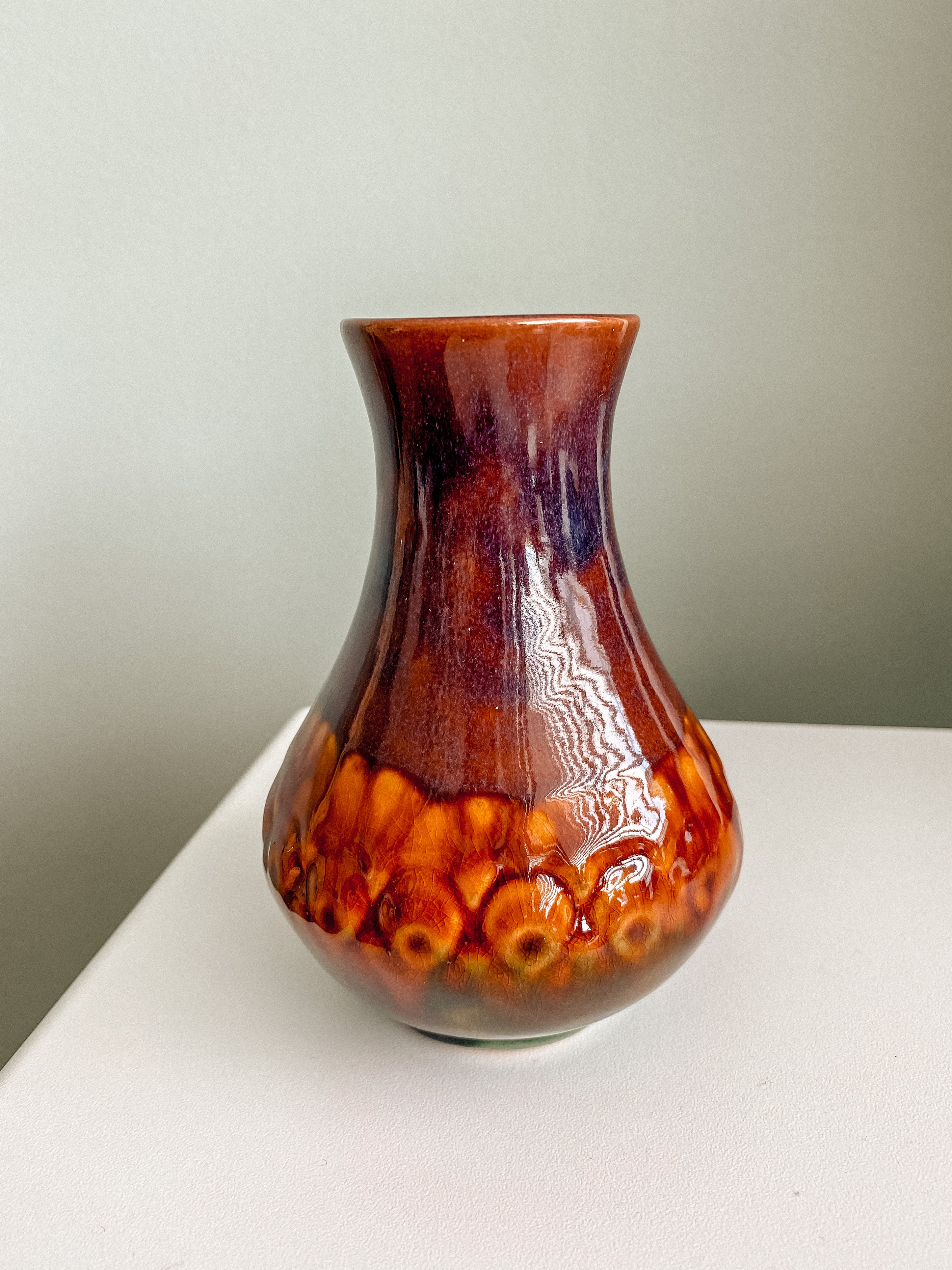 Curved clay vase