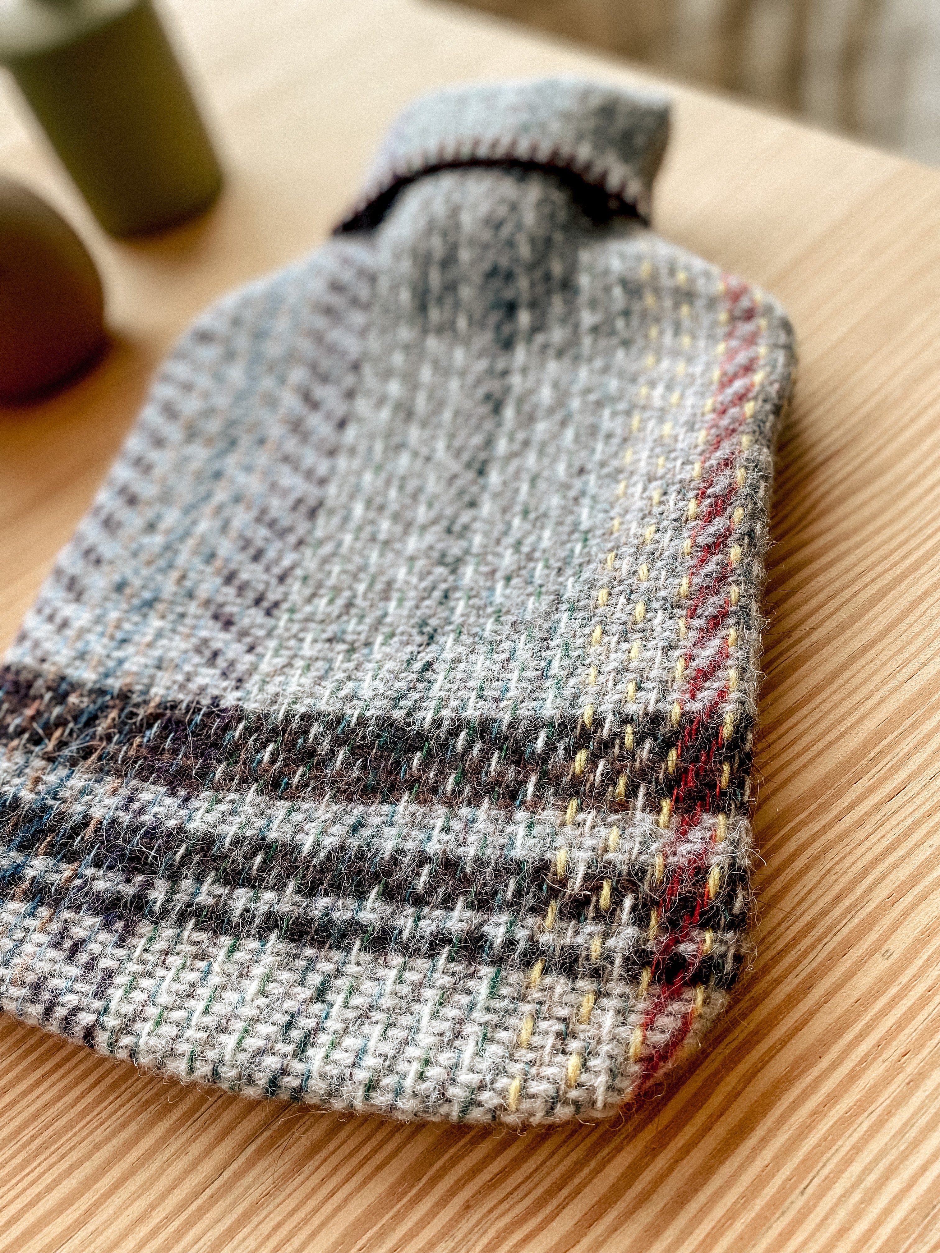 Hot water bottle made from recycled wool